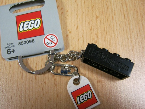 2 x 4 Brick - Black Key Chain with Lego Logo Tile, Modified 3 x 2 Curved with Hole and Engraved 'LEGOshop.com' Pattern