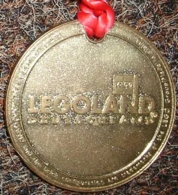 Medal from Goldwash in LEGOLAND - Metal, Brick with Flag Pattern (Legoland Deutschland)