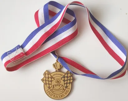 Medal with Ribbon, Metal, LEGOLAND, 'LEGO RACERS NO. 1', Rocket Racer Minifigure Head with Helmet with 'RR' Logo and Checkered Flags Pattern