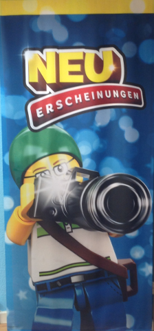 Display Flag Cloth, Multiple Themes, Minifigure Photographer, 'NEU ERSCHEINUNGEN'