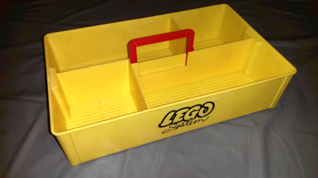 Storage Bin with Retractable Red Handle on Top, Reinforced Short Sides, Studs on Bottom - LEGO System Pattern