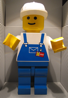 Display Figure 7in x 11in x 19in (blue overalls, blue pants, construction helmet)