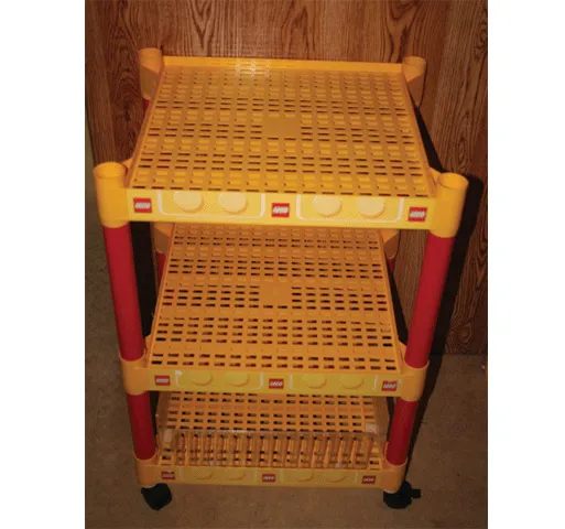 Display Floor Shelf with Lego Logo Sticker Tape and Four Red Support Tubes, on Casters