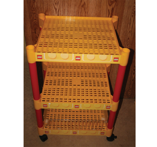 Display Floor Shelf with Lego Logo Sticker Tape and Four Red Support Tubes, on Casters