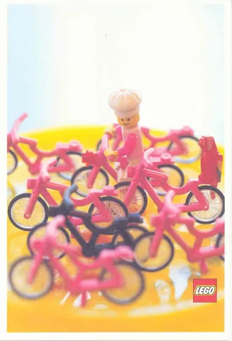 Postcard - Lego Art Project 2002 - 026 - Cook Minifigure and Red Parrot with 8 Bicycles
