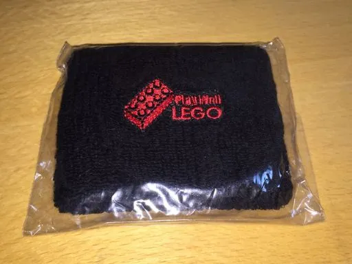 Wristband, Terrycloth Black with 'Play Well LEGO' and Red 2 x 4 Brick Pattern
