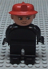 Duplo Figure, Male Fireman, Black Legs, Black Top (no buttons), Red Fire Helmet