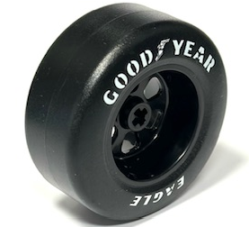Wheel 50 x 22 with Axle Hole and 6 Holes with Molded Black Hard Rubber Tire and Printed White 'GOODYEAR EAGLE' Pattern