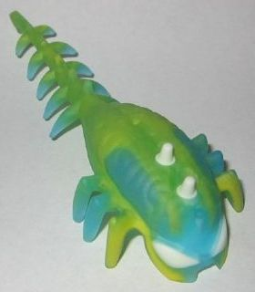 Hero Factory Brain with Molded Hard Plastic Glow In Dark White Eyes and Spikes and Marbled Yellow Pattern - Flexible Rubber