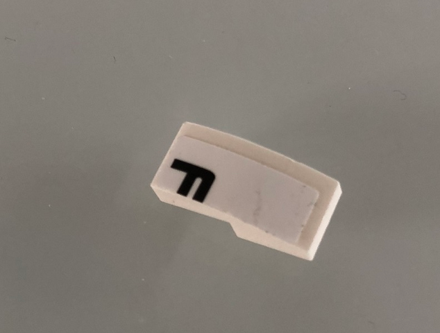 Slope, Curved 2 x 1 x 2/3 with Black Letter F on White Background Pattern Model Right Side (Sticker) - Set 42096