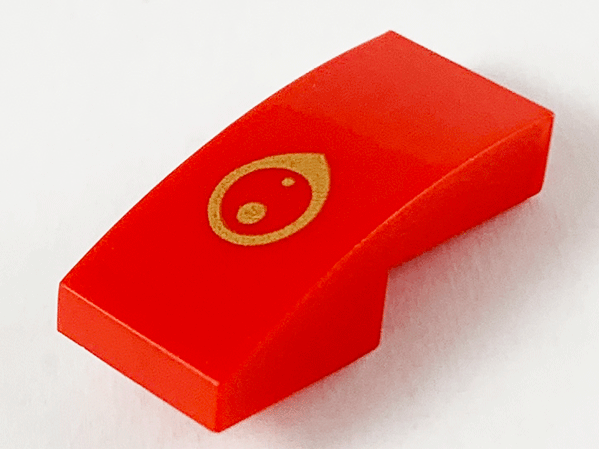 Slope, Curved 2 x 1 x 2/3 with Gold Eye Pattern