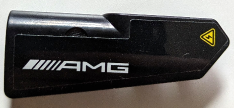 Technic, Panel Fairing #21 Very Small Smooth, Side B with White 'AMG' Logo and Yellow Electricity Warning Triangle Pattern (Sticker) - Set 42165