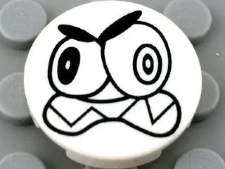 Tile, Round 2 x 2 with Bottom Stud Holder with Black Large Eyes and Scowl with Sharp Teeth (Nixel Face) Pattern