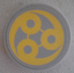 Tile, Round 2 x 2 with Bottom Stud Holder with Yellow Swirl SW Ado Eemon Emblem Pattern (Sticker) - Set 75042