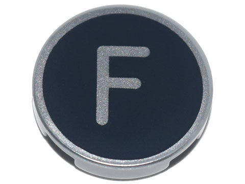 Tile, Round 2 x 2 with Bottom Stud Holder with Silver Capital Letter F on Black Background Pattern