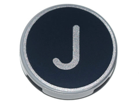 Tile, Round 2 x 2 with Bottom Stud Holder with Silver Capital Letter J on Black Background Pattern