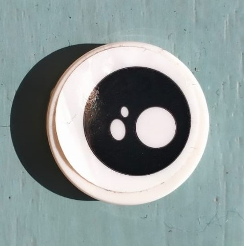 Tile, Round 2 x 2 with Bottom Stud Holder with Black Eye, White Pupil and 2 White Ovals Pattern Model Right Side (Sticker) - Set 40251