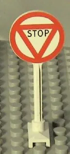 Road Sign Round with 'STOP' in Triangle Pattern