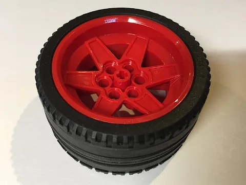 Wheel 56mm D. x 34mm Technic Racing Medium, 6 Pin Holes with Black Tire 68.8 x 36 ZR (15038 / 44771)