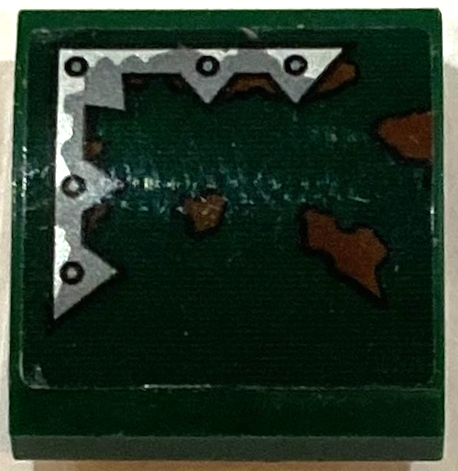Slope, Curved 2 x 2 x 2/3 with Silver Metal Plate with Spikes and Rivets and Reddish Brown Mud Splotches Pattern Model Left Side (Sticker) - Set 70434