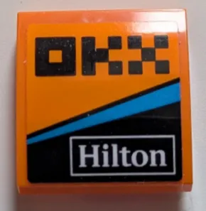 Slope, Curved 2 x 2 x 2/3 with Black Pixelated 'OKX', White 'Hilton' and Dark Azure Stripe Pattern Model Left Side (Sticker) - Set 76919
