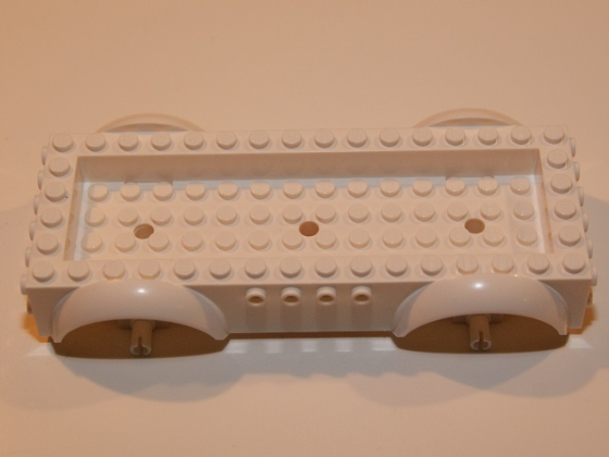 Vehicle, Base 8 x 16 x 2 1/2 with Mudguards Raised, 4 x 14 Recessed Center with 3 Holes, and (Same Color) Wheels Holders