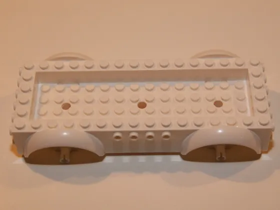 Vehicle, Base 8 x 16 x 2 1/2 with Mudguards Raised, 4 x 14 Recessed Center with 3 Holes, and (Same Color) Wheels Holders