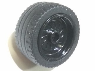 Wheel 18mm D. x 12mm with Axle Hole and Stud with Black Tire 24 x 12 Low (18976 / 18977)