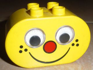 Duplo, Brick 2 x 4 x 2 Rounded Ends, Rattling Eyes with Red Nose and Black Freckles and Smile Pattern