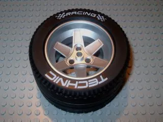 Wheel 62mm D. x 46mm Technic Racing Large, with Black Tire Technic Racing Large with 'Technic Racing' White Pattern (22969 / 32296pb01)
