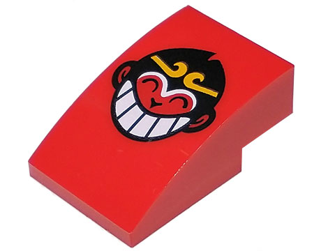 Slope, Curved 3 x 2 with Monkey Face with Black Hair, Bright Light Orange Crown, and White Grinning Teeth (Monkie Head Logo) Pattern