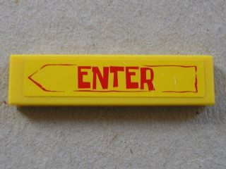 Tile 1 x 4 with Red 'ENTER' in Arrow Pattern (Sticker) - Sets 3825 / 3833