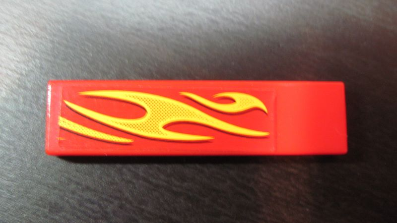 Tile 1 x 4 with Yellow Flames Pattern Model Front Left Side (Sticker) - Set 8667