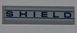 Tile 1 x 4 with 'SHIELD' Pattern (Sticker) - Set 6867