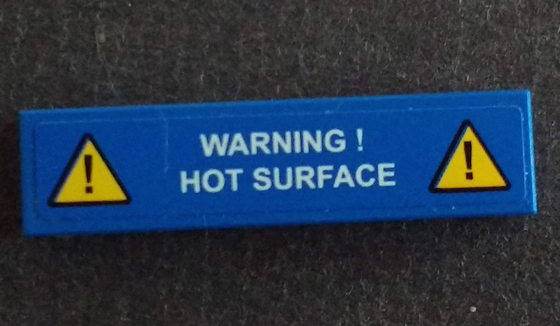 Tile 1 x 4 with Exclamation Mark in Warning Triangle and 'WARNING! HOT SURFACE' Pattern (Sticker) - Set 42042