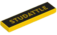 Tile 1 x 4 with 'STUDATTLE' on Black Background Pattern
