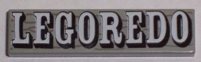 Tile 1 x 4 with Black and White 'LEGOREDO' on Wood Grain Pattern
