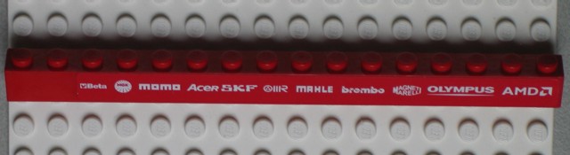 Brick 1 x 16 with White 'Beta', 'NGK', 'MOMO', 'ACER', 'SKF', 'MAHLE', 'brembo', 'MAGNETI MARELLI', 'OLYMPUS' and 'AMD' Pattern (Sticker) - Set 8654