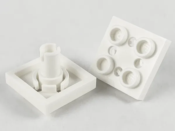 Plate, Modified 2 x 2 with Pin on Bottom, Small Holes in Plate and Locking Fingers on Underside