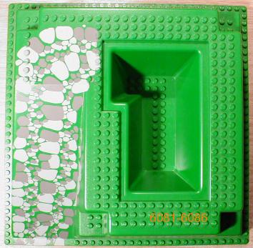 Baseplate, Raised 32 x 32 with Ramp and Pit with Dark Gray and Light Gray Rocks Pattern