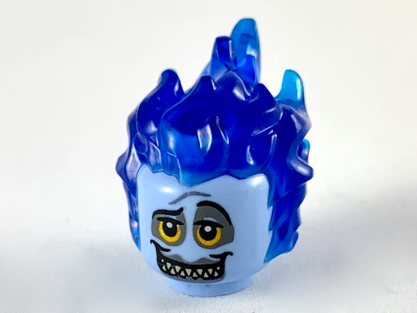 Minifigure, Head, Modified with Molded Trans-Dark Blue Flaming Hair and Printed Bright Light Orange Eyes with Dark Bluish Gray Rings, Sharp Teeth Pattern (Hades)