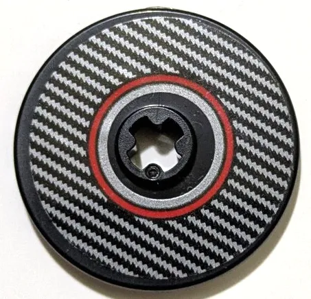 Technic, Disk 3 x 3 with Silver Carbon Fiber and Red Circle Pattern Model Left Side (Sticker) - Sets 42151 / 42162