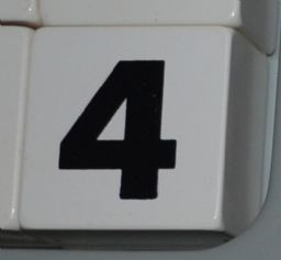 Duplo, Tile 2 x 2 x 1 with Black Number 4 Pattern