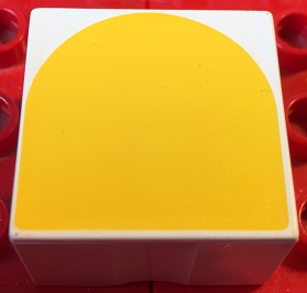 Duplo, Tile 2 x 2 x 1 with Shape Yellow Inverse Arch Pattern