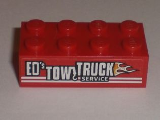 Brick 2 x 4 with 'ED'S TOW TRUCK SERViCE' Pattern Model Left Side (Sticker) - Set 8195
