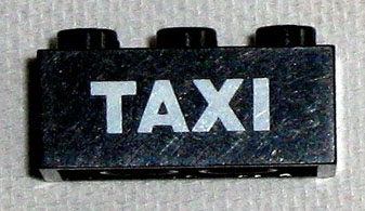 Brick 2 x 3 with White 'TAXI' Sans-Serif Pattern