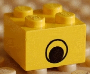 Brick 2 x 2 with Black Eye Centered Pattern on Opposite Sides