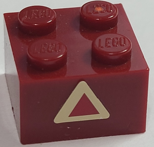 Brick 2 x 2 with Dark Red Triangle on Tan Background Pattern (Sticker) - Set 7475