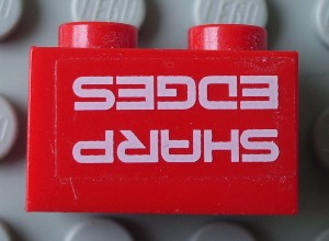 Brick 1 x 2 with 'SHARP EDGES' Upside Down Pattern (Sticker) - Set 7701