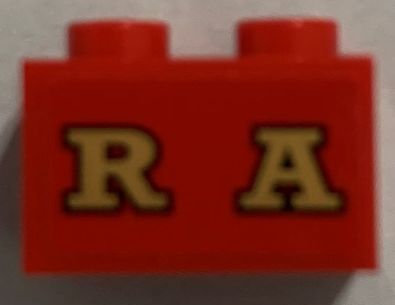 Brick 1 x 2 with Gold 'RA' (RAILROAD) on Red Background Pattern (Sticker) - Set 71044